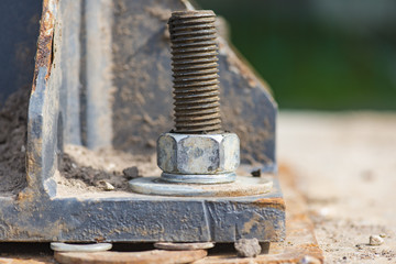 Close-up nut and bolt at a site construction in a street