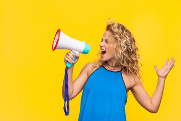 Expressive woman speaking with megaphone