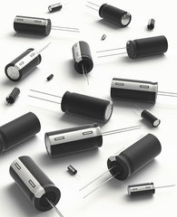 3D realistic render of black group capacitors on white background with shadow.
