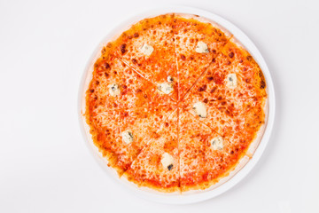 pizza with blue cheese in a circular white plate on a light background (top view)