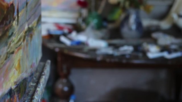 The artist paints in the Studio oil painting