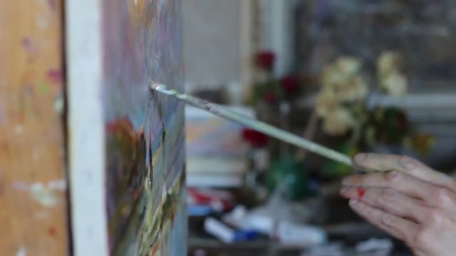 The artist paints in the Studio oil painting