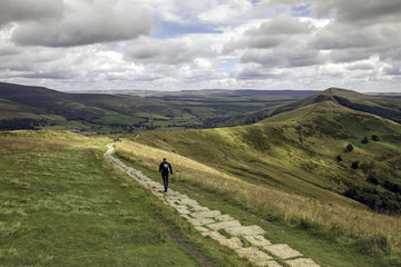 Fototapeta na wymiar Man walking in the Derbyshire Countryside in the UK
