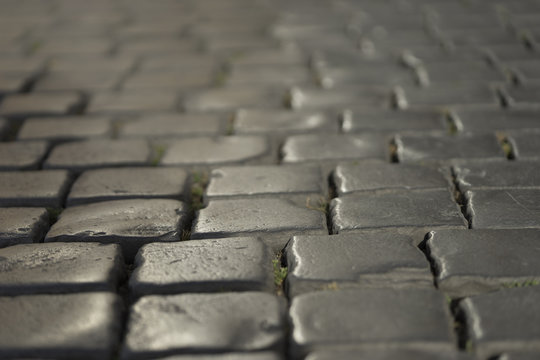 Fototapeta Very old and unique roman stone pavement in Rome, Italy, June 20