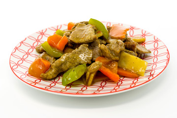 wok fried chicken stir fry with sweet peppers and chinese vegetables