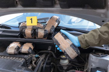 Drug smuggling in a car engine compartment