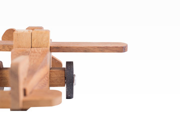 Wooden plane on white background.