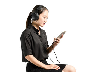 Portrait of a young business woman smiling with earbuds / headphone for listening to music or...