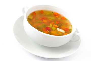 Vegetable soup isolated on white background

