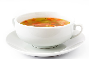 Vegetable soup isolated on white background

