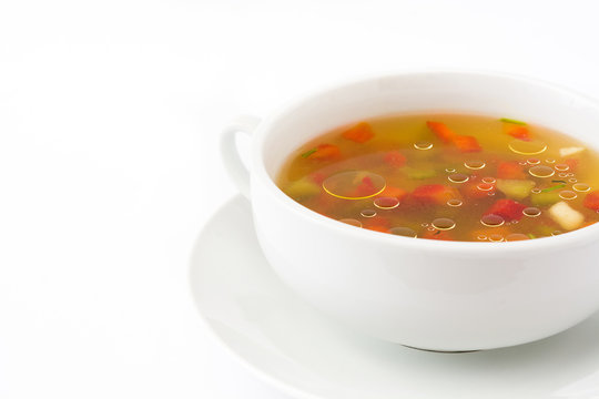 Vegetable soup isolated on white background

