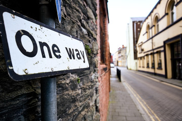 One way road sign in a street in Derry  Northern Ireland