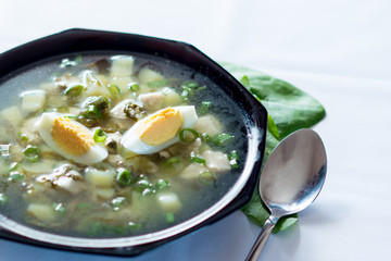 A fresh green soup with spinach sorrel egg potato