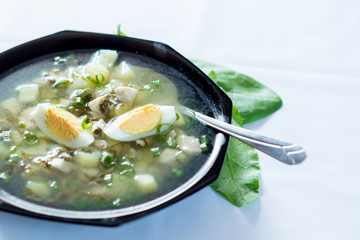A fresh green soup with spinach sorrel egg potato