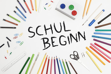 colorful school accessories on a white background
