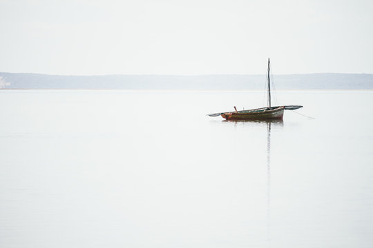 Lonely boat on calm sea