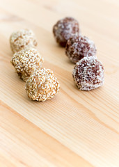 Homemade healthy paleo dates and chocolate energy balls. Vegan truffles. Copy space. Soft toned