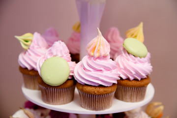 Multi-colored cream cup cakes