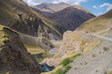 Scenic view of the autumn mountains of the Caucasus and valley of the winding river. Nature and travel. Russia, Dagestan