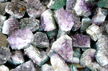 many Amethyst in different colors close up