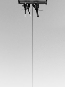 Skiers taking a chairlift