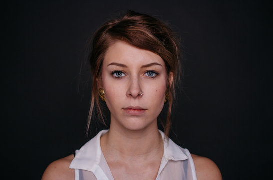 portrait of young beautiful female looking at camera