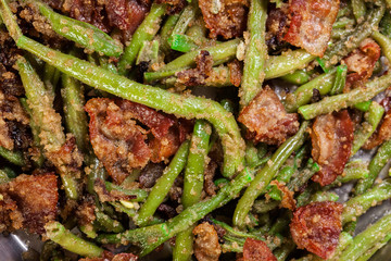 Close-up of healthy sauteed green beans with bacon, onion, and bread crumbs