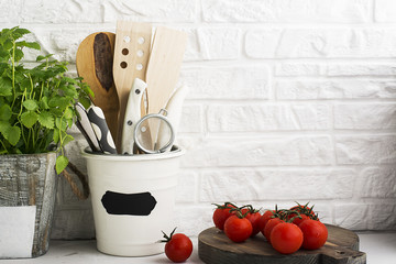 Kitchen still life on a white brick wall background