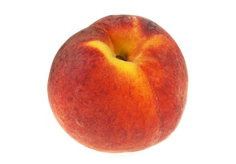 Ripe peach isolated on a white background