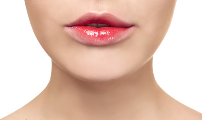 Young woman with beautiful lips on white background, closeup