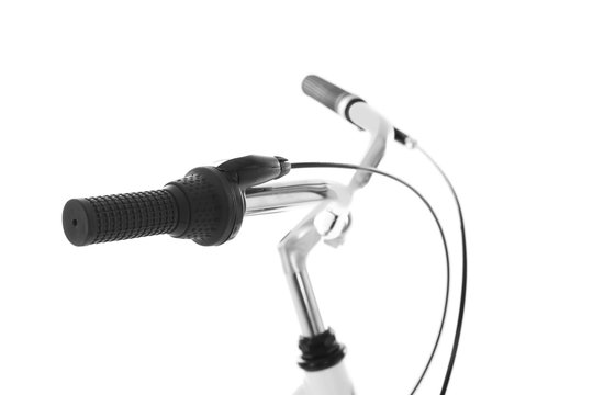 Bicycle handlebar on white background, closeup