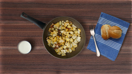 Fried potatoes in a cast-iron frying pan
