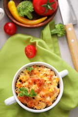 Composition with delicious turkey casserole on table
