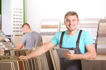 Carpenter searching for materials in hardware store
