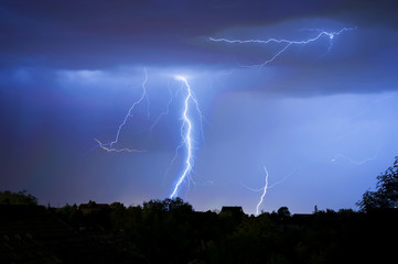 Thunder, lightning and storm in dark night sky