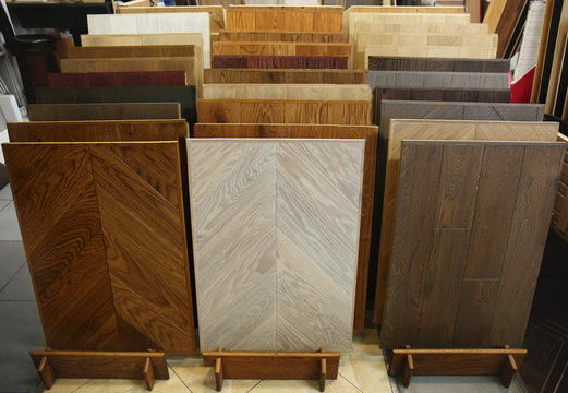 Assortment of laminated flooring samples in hardware store