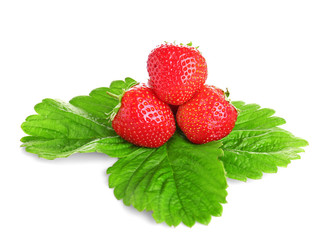 Ripe strawberries and leaves on white background