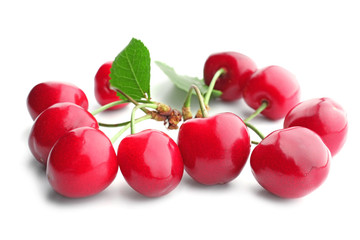 Fresh ripe cherries on white background