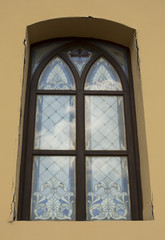 Obraz premium Beautiful stained glass window on the facade of the castle