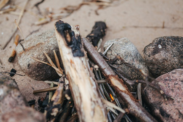 a campfire on the sand
