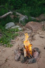 a campfire on holiday on the sand