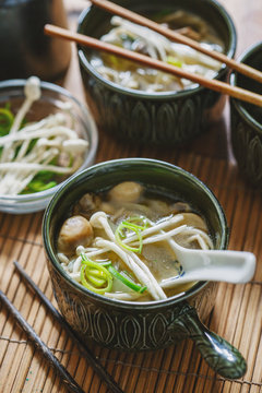 Miso with enoki mushrooms.