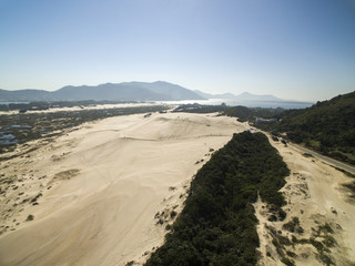 Aerial view Dunes in sunny day - Joaquina beach - Florianopolis - Santa Catarina - Brazil. July, 2017