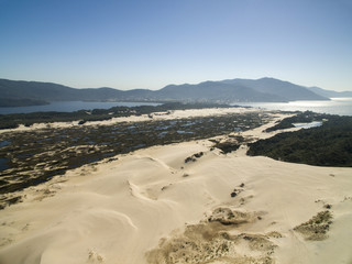 Aerial view Dunes in sunny day - Joaquina beach - Florianopolis - Santa Catarina - Brazil. July, 2017