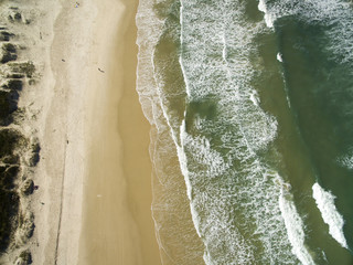 Fototapeta na wymiar Aerial view Dunes in sunny day - Joaquina beach - Florianopolis - Santa Catarina - Brazil. July, 2017