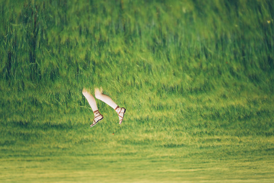Woman enjoying on the grass