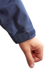 man hand in waterproof clothing jacket