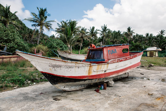 Damaged fishing boats awaiting repairs