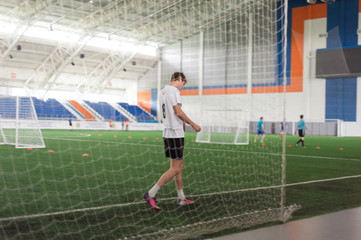 Soccer player warming up on field