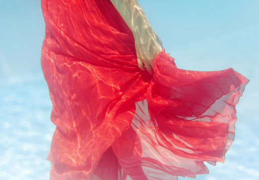Woman Walking Underwater